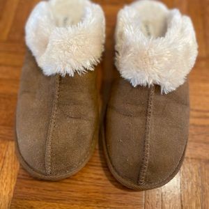 snug and warm faux fur lined suede slippers.